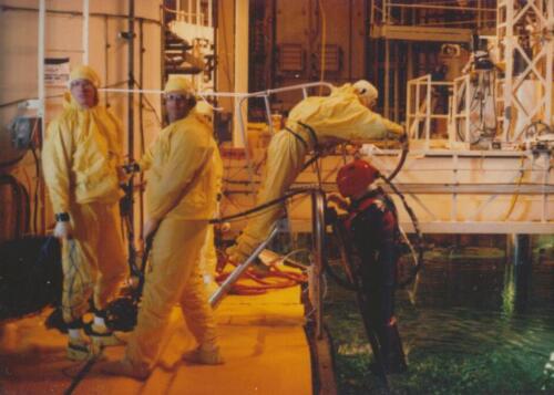 Wet down prior to going into reactor pool